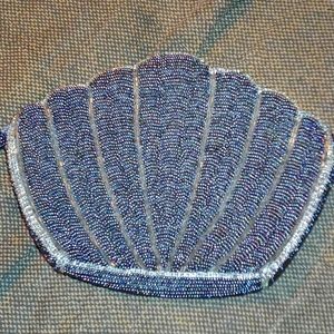 Genie seashell beaded clutch